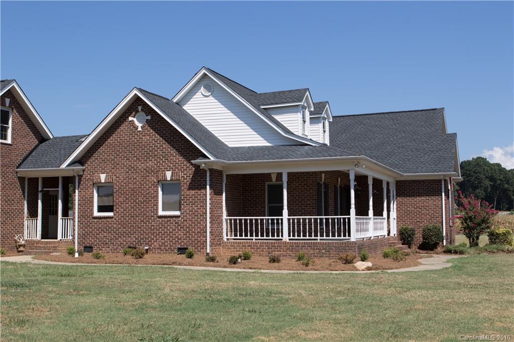 3112 Edwards Road Wingate, NC 28174 - Photo 3 of 21 a front view of a house with a yard