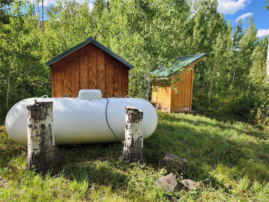 52002 County Road 8 Hamilton, CO 81638 - Photo 12 of 37 a view of backyard with outdoor seating and green space