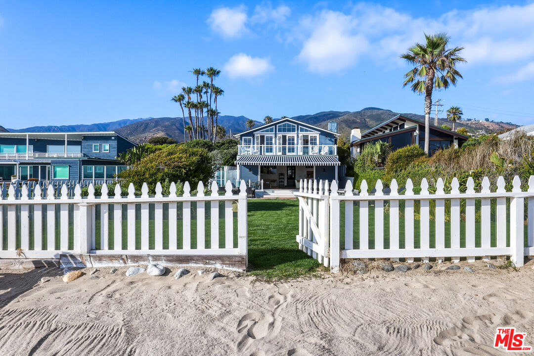 30810 Broad Beach Road Malibu, CA 90265 - Photo 6 of 55 a front view of a house with a garden