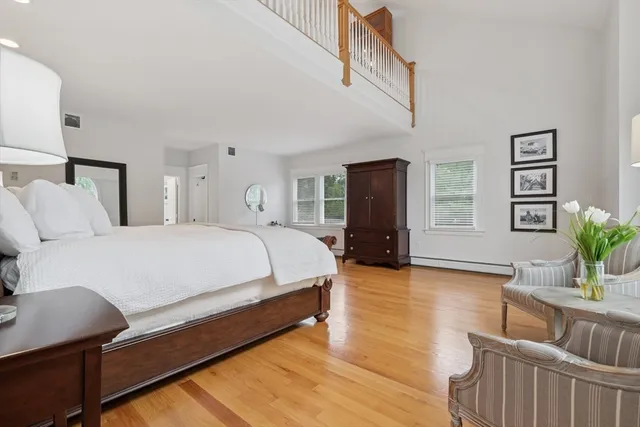 a view of a livingroom with furniture and cabinets