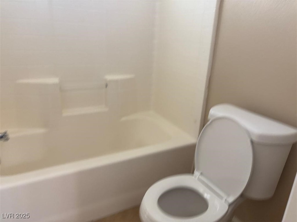 8690 West Diamond Sand Avenue Las Vegas, NV 89178 - Photo 17 of 25 Bathroom 2 with shower / tub combination and toilet