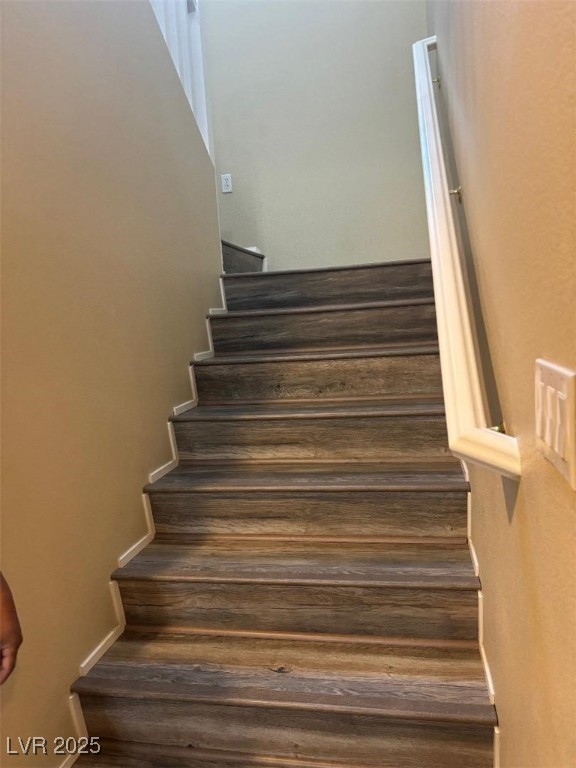 8690 West Diamond Sand Avenue Las Vegas, NV 89178 - Photo 20 of 25 Stairs featuring baseboards and wood finished floors