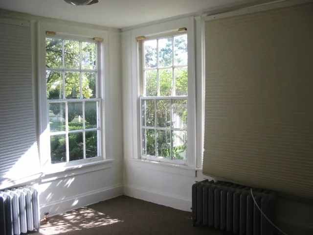 a view of a room that has a window in it