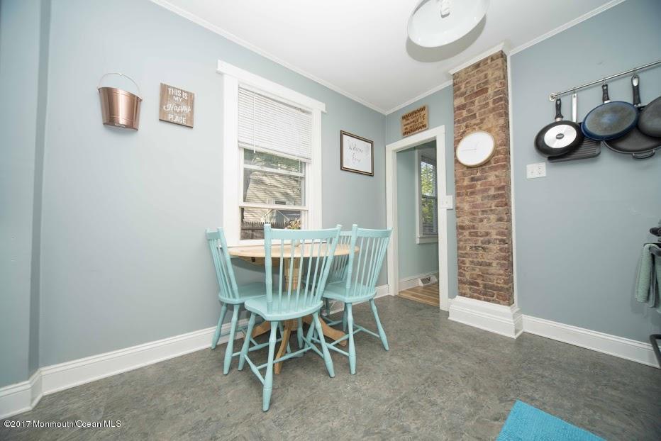 402 Maple Drive Belford, NJ 07718 - Photo 12 of 18 a dining room with furniture and window