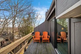 a kitchen with a dining table and chairs