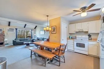 a kitchen with cabinets appliances and a counter top space