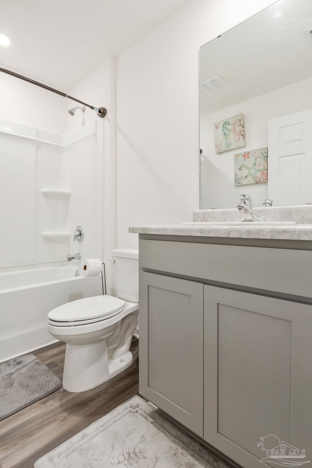 1625 Addies Way Pensacola, FL 32534 - Photo 39 of 50 a bathroom with a toilet sink and shower