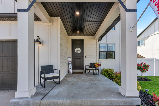 252 North Sunrise Rnch Drive Mapleton, UT 84664 - Photo 5 of 62 Covered front porch featuring a dark wood-finish ceiling with recessed lighting