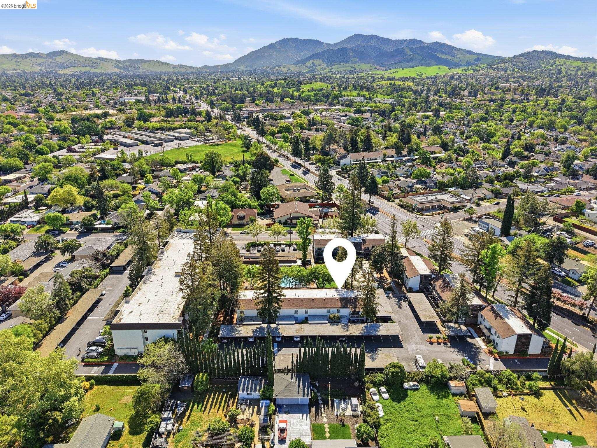 4081 Clayton Road, Unit 118 Concord, CA 94521 - Photo 28 of 30 an aerial view of residential houses with outdoor space and trees
