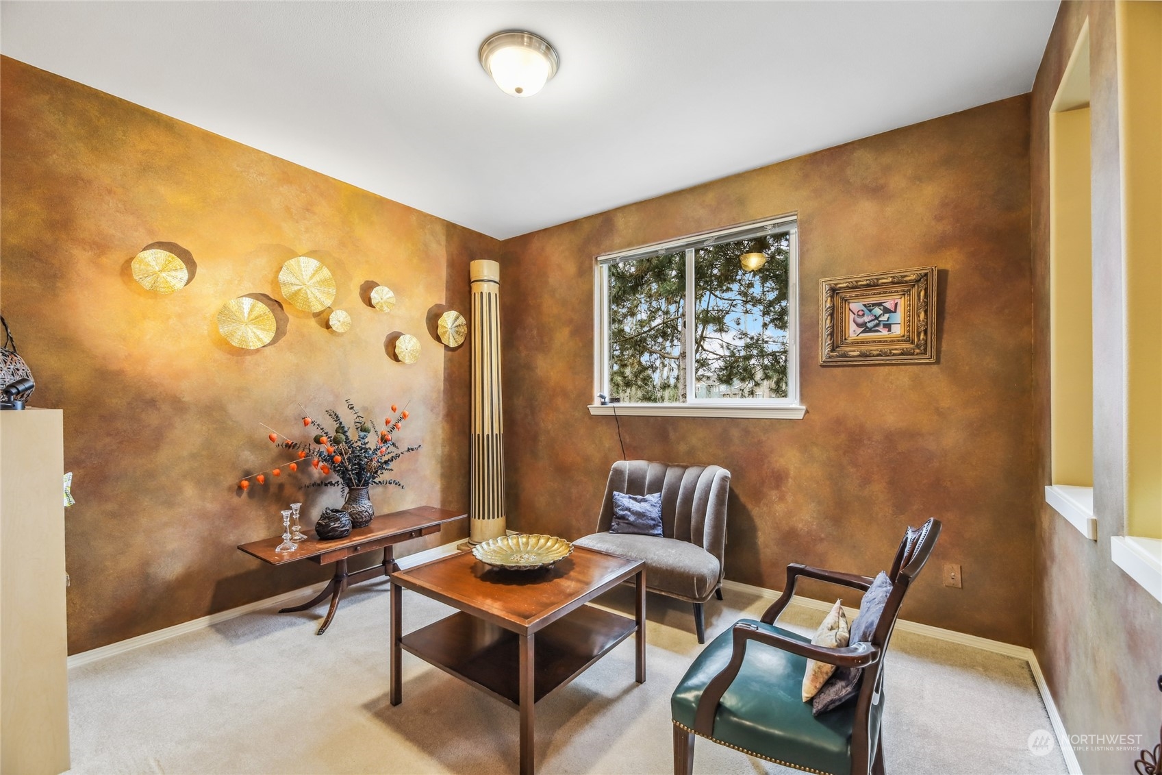 210 202nd Street Southeast Bothell, WA 98012 - Photo 11 of 33 a living room with furniture and wall paintings
