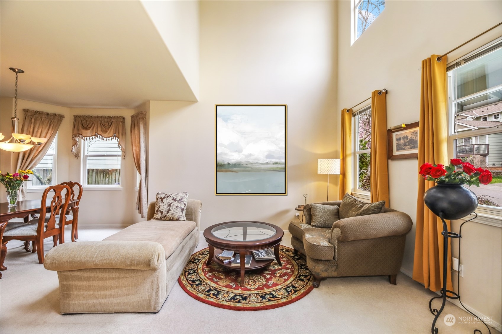 210 202nd Street Southeast Bothell, WA 98012 - Photo 13 of 33 a living room with furniture and a large window
