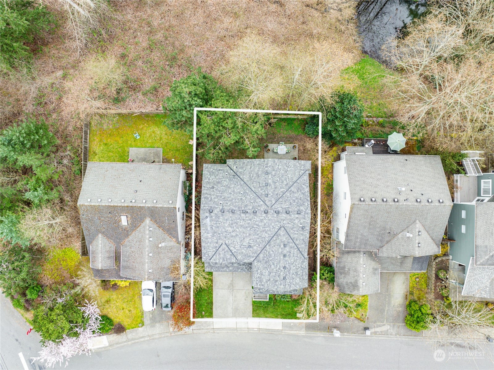 210 202nd Street Southeast Bothell, WA 98012 - Photo 33 of 33 an aerial view of a house with a garden and large trees