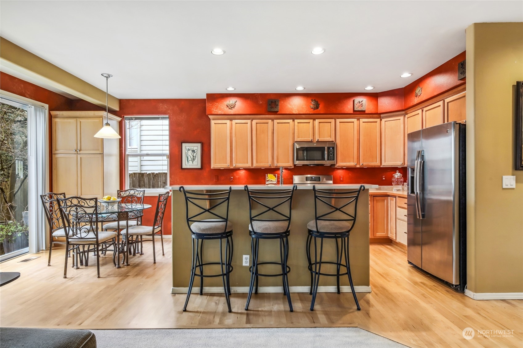 210 202nd Street Southeast Bothell, WA 98012 - Photo 5 of 33 a view of a dining room with furniture and wooden floor