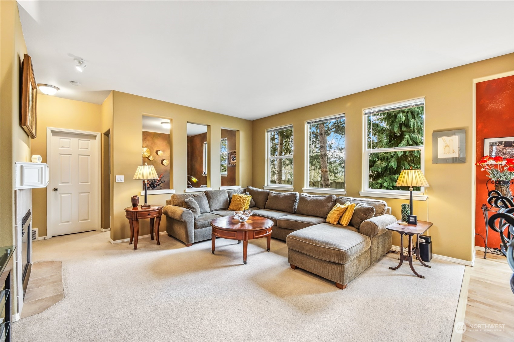 210 202nd Street Southeast Bothell, WA 98012 - Photo 9 of 33 a living room with furniture and a large window