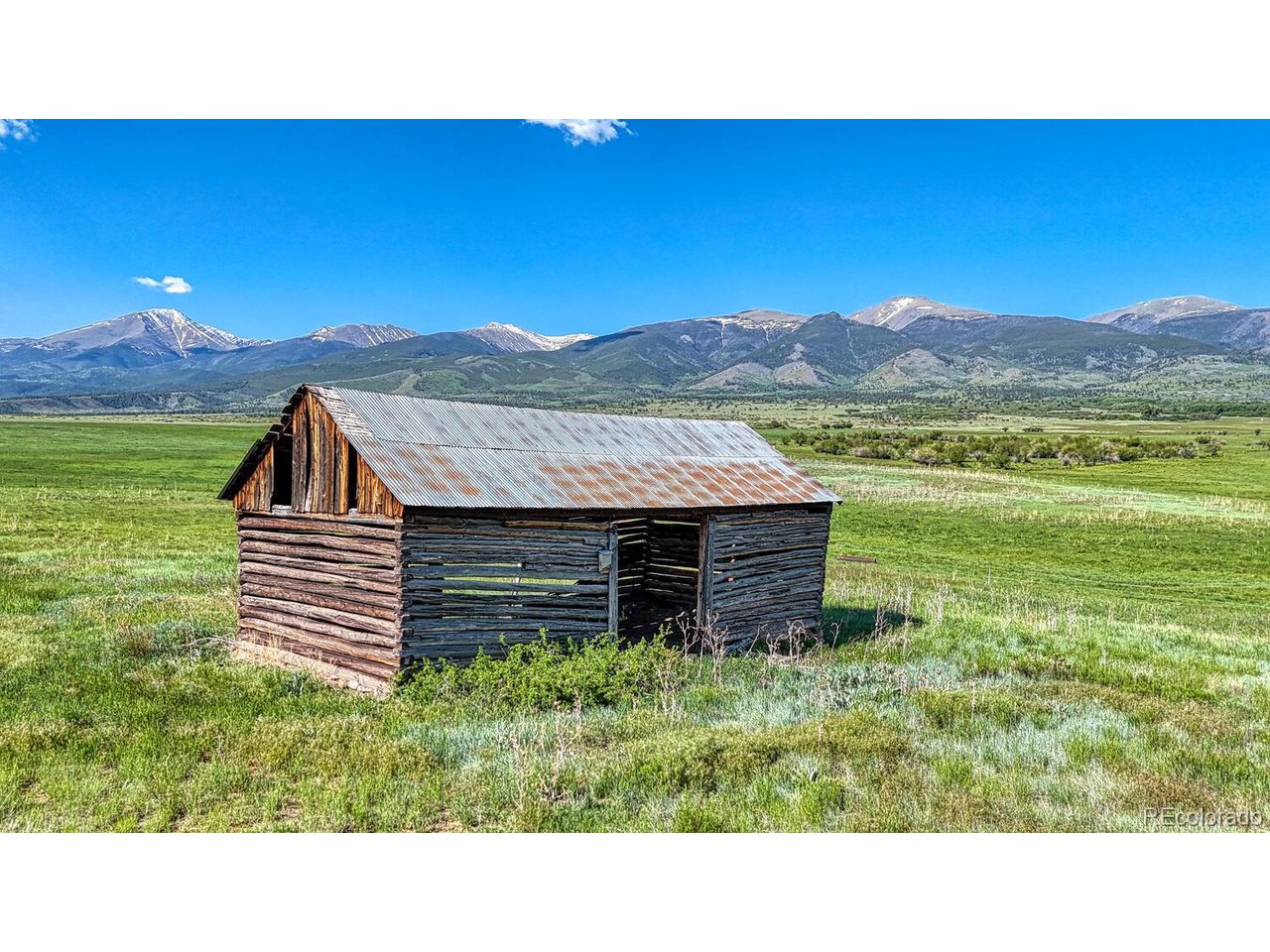 a view of a backyard with a mountain view