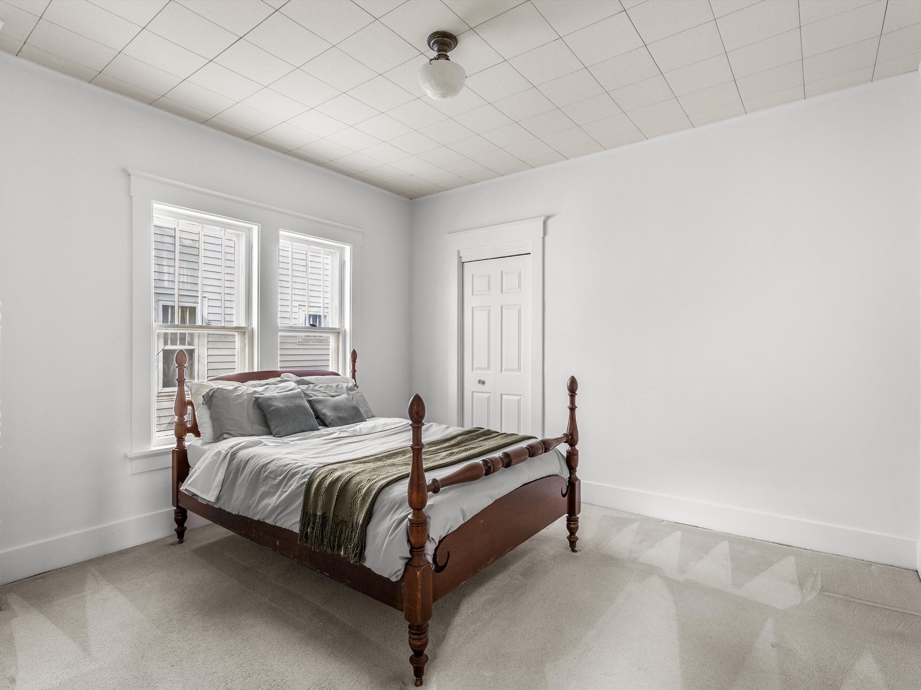 904 North 9th Street Manitowoc, WI 54220 - Photo 15 of 40 1st Floor Primary Bedroom