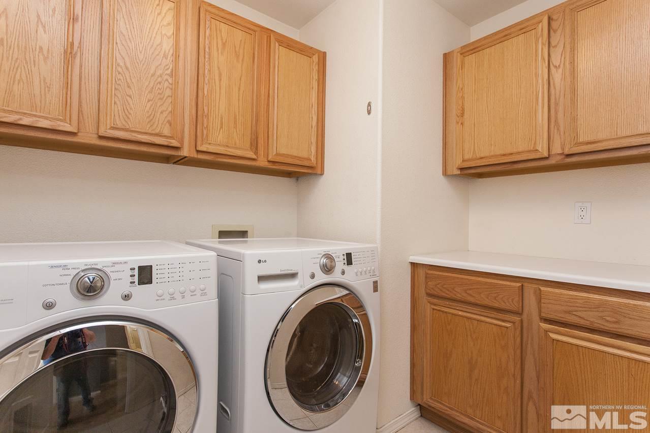 6020 Sunrise Meadows Loop Reno, NV 89519 - Photo 24 of 30 a utility room with sink dryer and washer
