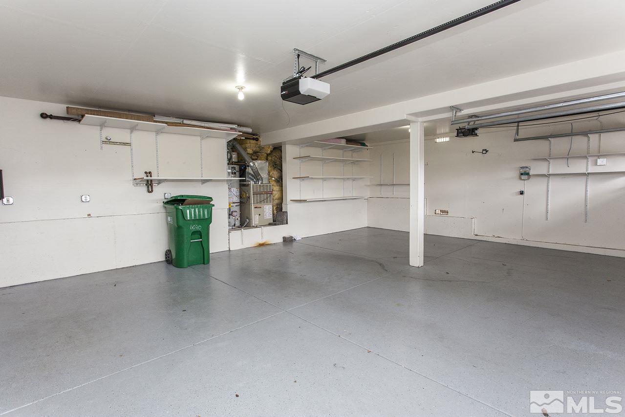 6020 Sunrise Meadows Loop Reno, NV 89519 - Photo 25 of 30 a view of a refrigerator with wooden floor
