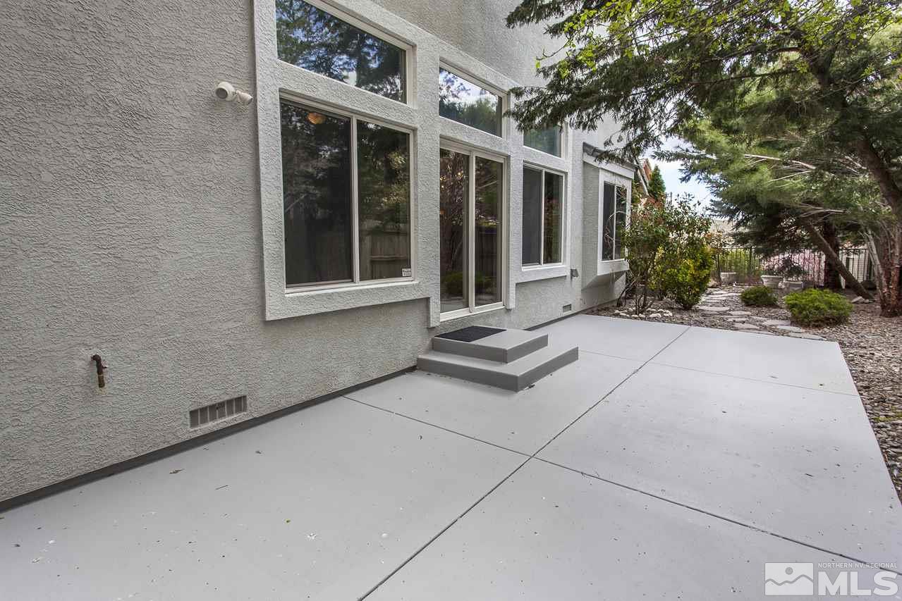 6020 Sunrise Meadows Loop Reno, NV 89519 - Photo 26 of 30 a view of a brick house with windows