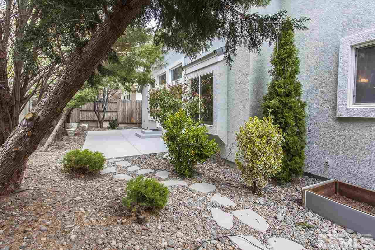 6020 Sunrise Meadows Loop Reno, NV 89519 - Photo 28 of 30 a front view of a house with garden