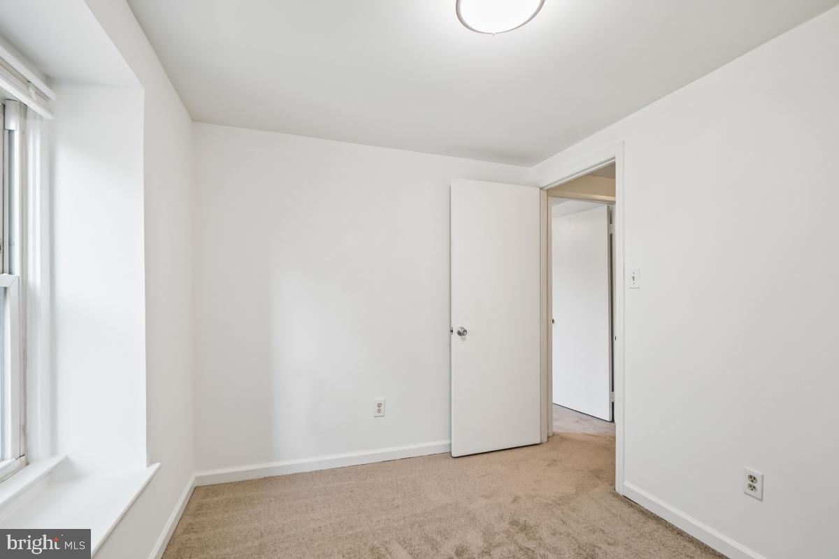 13221 Black Walnut Court Silver Spring, MD 20906 - Photo 18 of 30 a view of an empty room