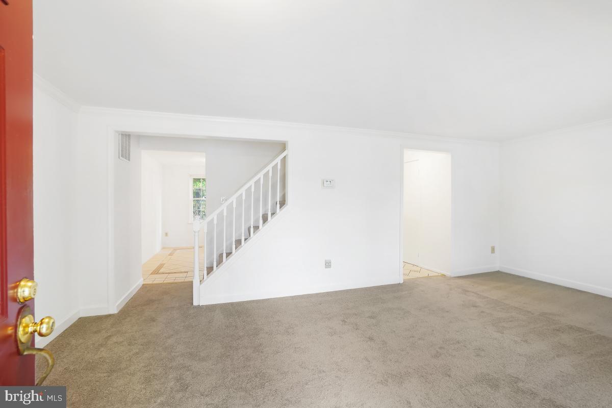 13221 Black Walnut Court Silver Spring, MD 20906 - Photo 3 of 30 a view of an empty room with stairs