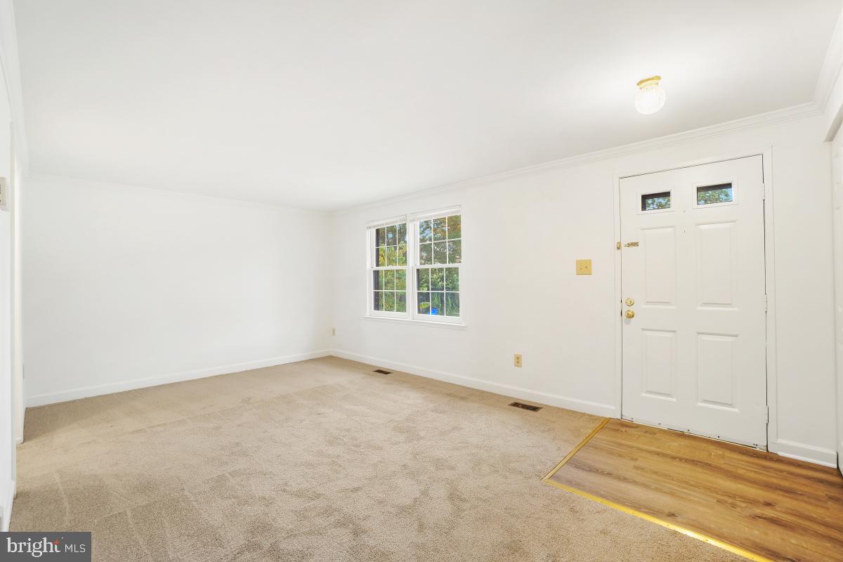 13221 Black Walnut Court Silver Spring, MD 20906 - Photo 5 of 30 an empty room with windows