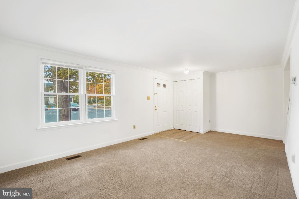 13221 Black Walnut Court Silver Spring, MD 20906 - Photo 6 of 30 an empty room with a window