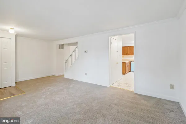 a view of a kitchen with marble kitchen and granite countertop a sink