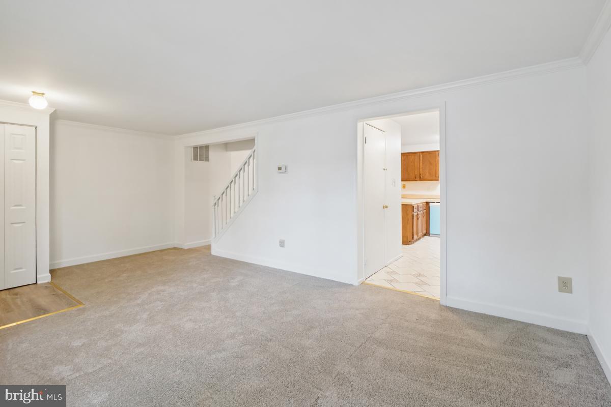 13221 Black Walnut Court Silver Spring, MD 20906 - Photo 7 of 30 an empty room with windows