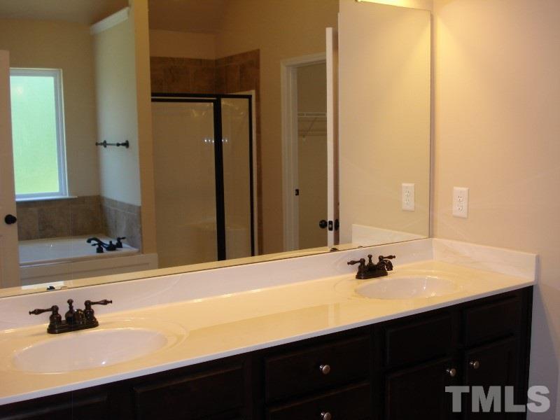 80 Germantown Road Cameron, NC 28326 - Photo 14 of 25 a bathroom with a sink and a mirror