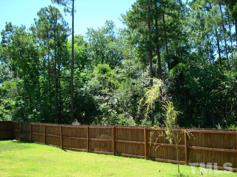 80 Germantown Road Cameron, NC 28326 - Photo 22 of 25 a view of a yard with wooden fence