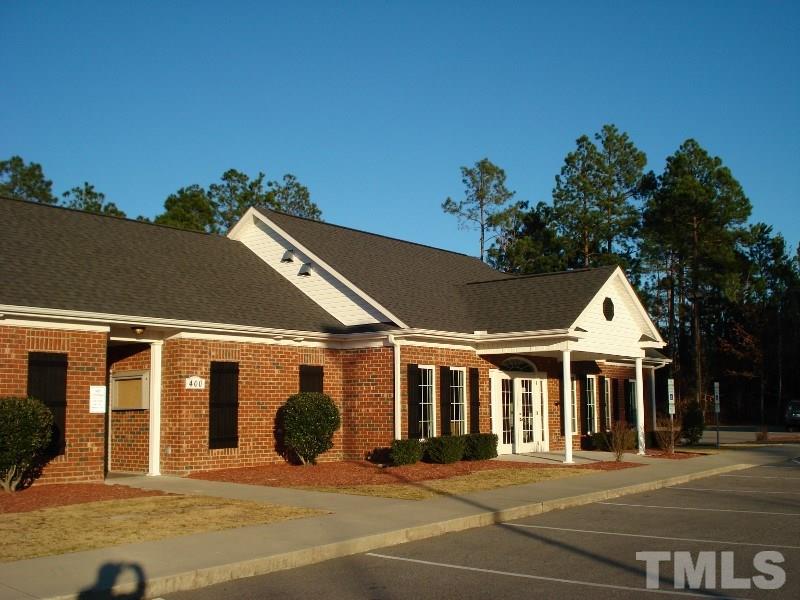 80 Germantown Road Cameron, NC 28326 - Photo 24 of 25 a front view of a building with a garden