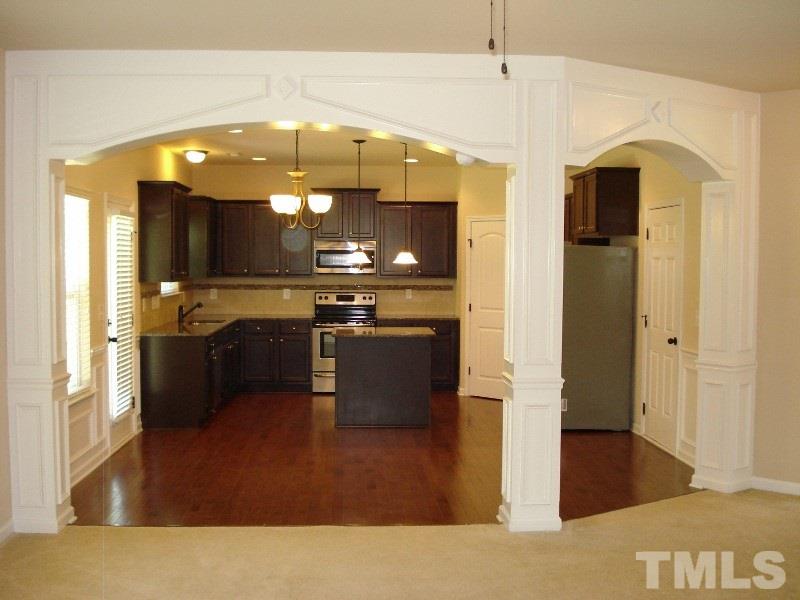 80 Germantown Road Cameron, NC 28326 - Photo 6 of 25 a kitchen with stainless steel appliances granite countertop a refrigerator and a stove