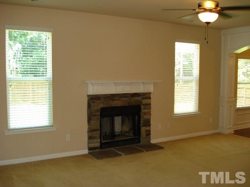 80 Germantown Road Cameron, NC 28326 - Photo 7 of 25 a living room with a fireplace and a window
