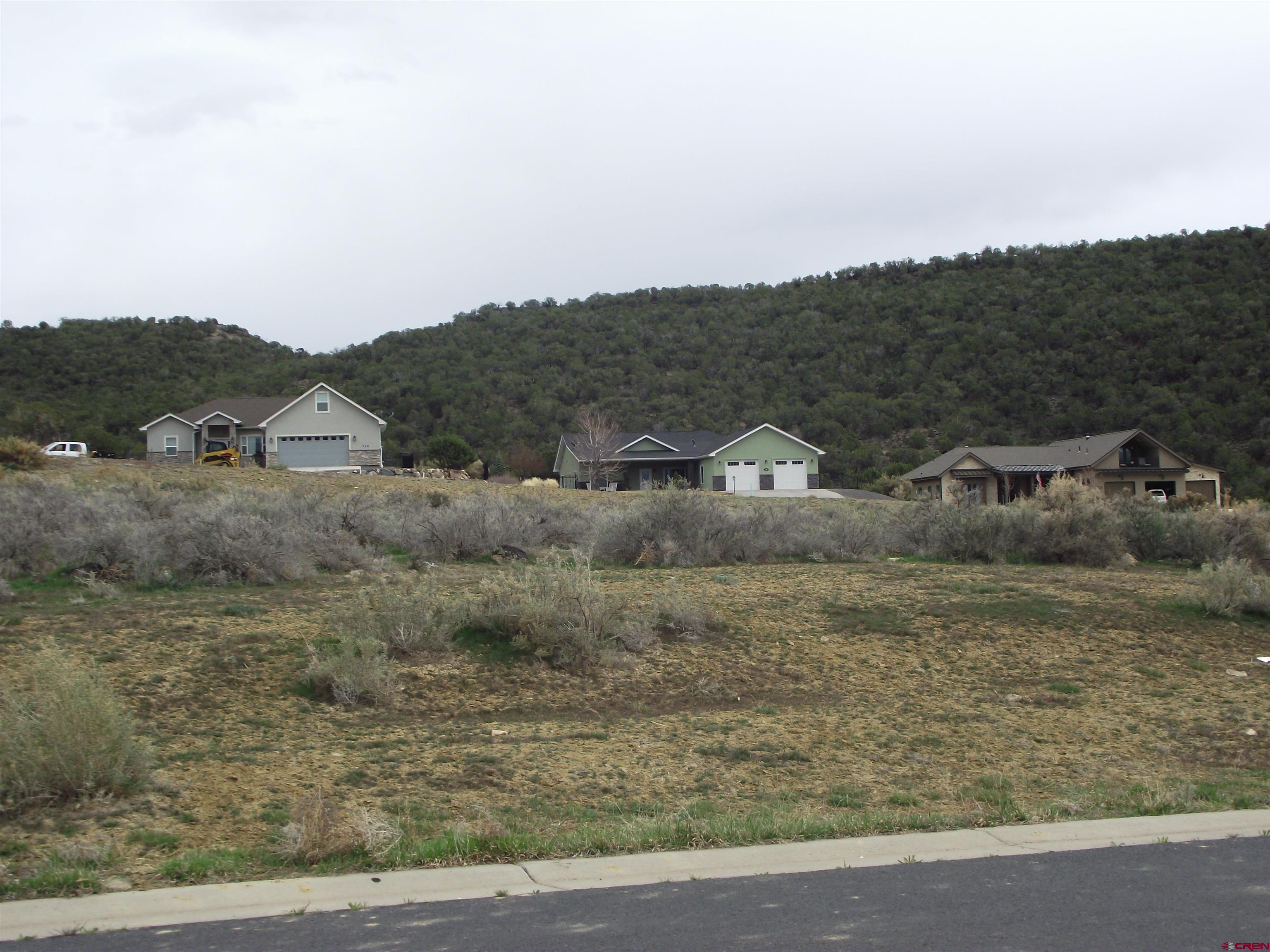 a view of houses with mountain view