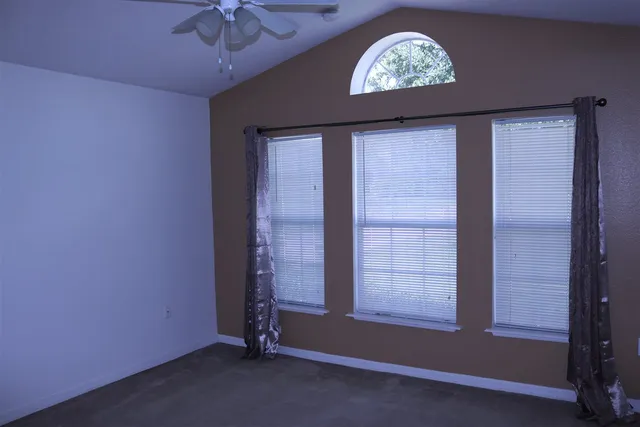 an empty room with windows