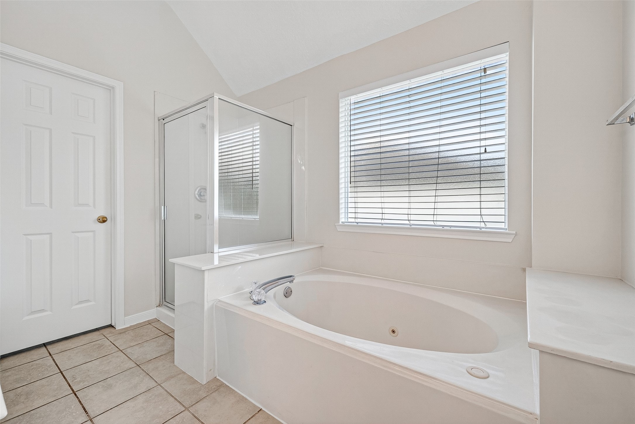 4539 Springfield Lakes Street Sugar Land, TX 77479 - Photo 26 of 34 a white bath tub sitting next to a window