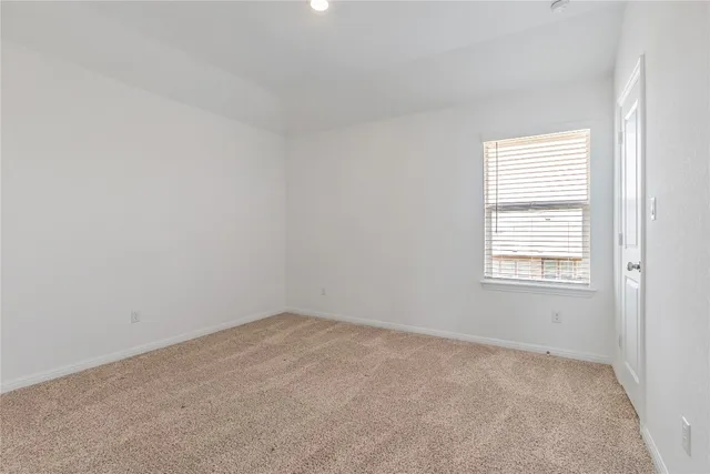 a view of a big room with a ceiling fan and a chandelier fan