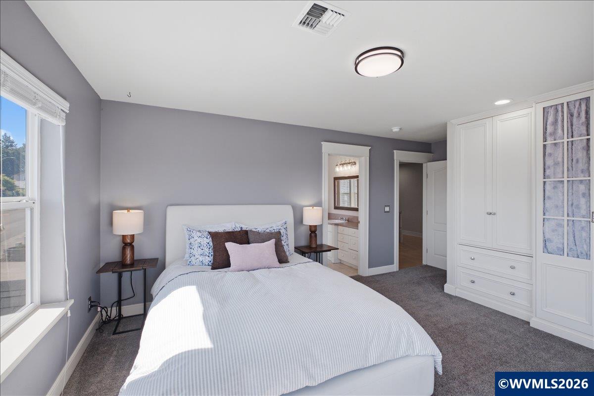 1492 Northwest Penny Lane Albany, OR 97321 - Photo 32 of 50 a bedroom with a bed and window