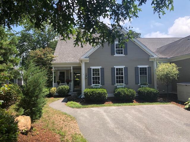 1 Prestwick Road Bourne, MA 02532 - Photo 2 of 32 a front view of a house with garden