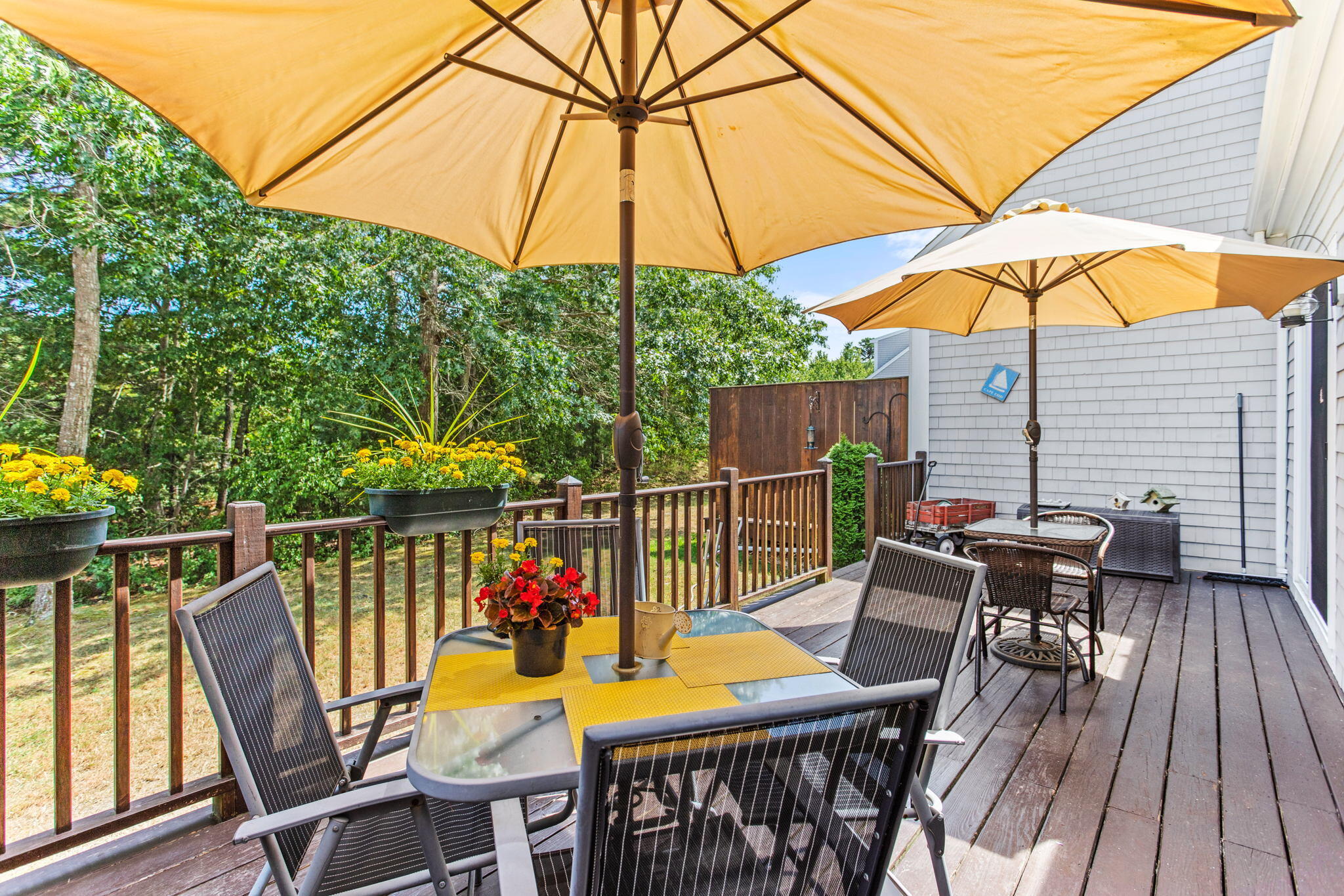 1 Prestwick Road Bourne, MA 02532 - Photo 23 of 32 a view of deck with furniture and barbeque oven in the backyard