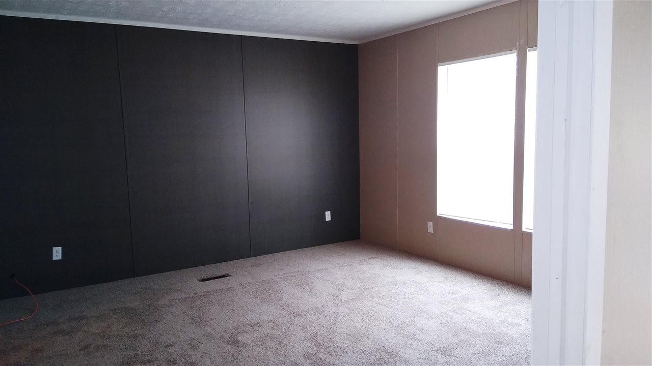 4224 Chicken George Trail Ripley, TN 38063 - Photo 5 of 8 an empty room with a window