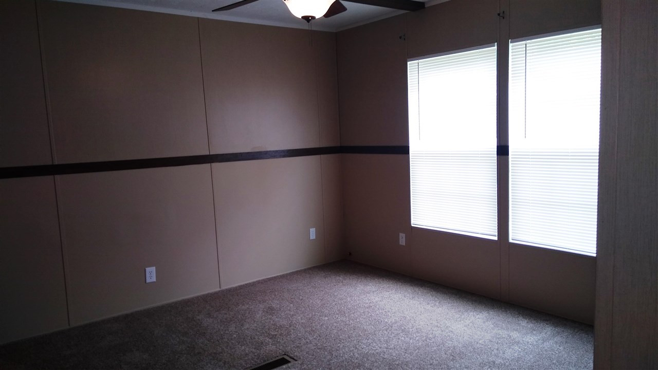 4224 Chicken George Trail Ripley, TN 38063 - Photo 6 of 8 a view of an empty room with a window