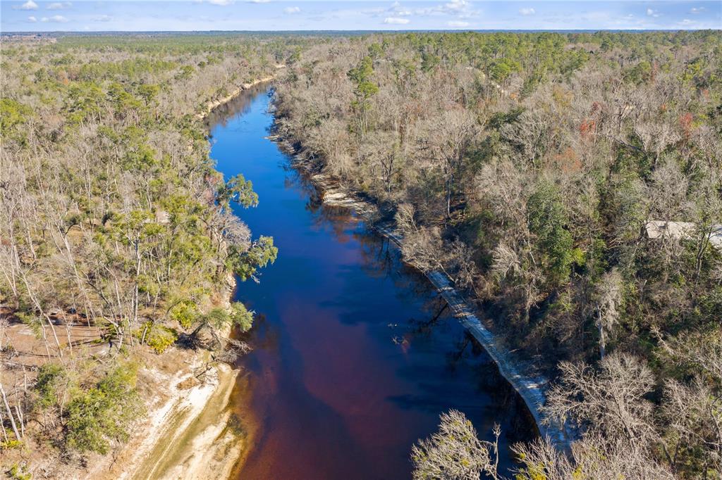 12th Terrace Live Oak, FL 32060 - Photo 8 of 69 a view of a lake with a yard