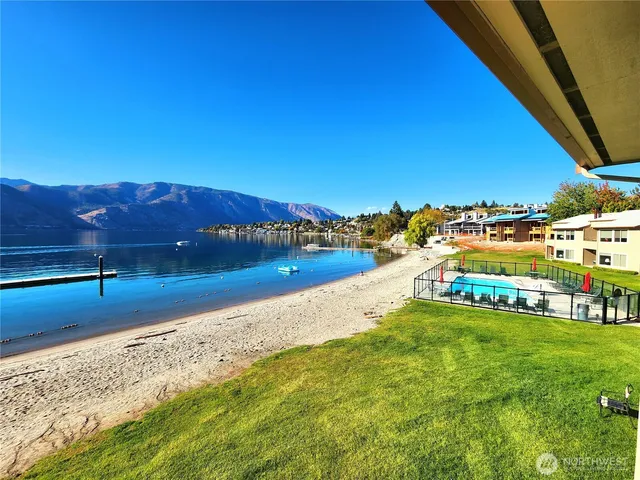 a view of a swimming pool with a patio