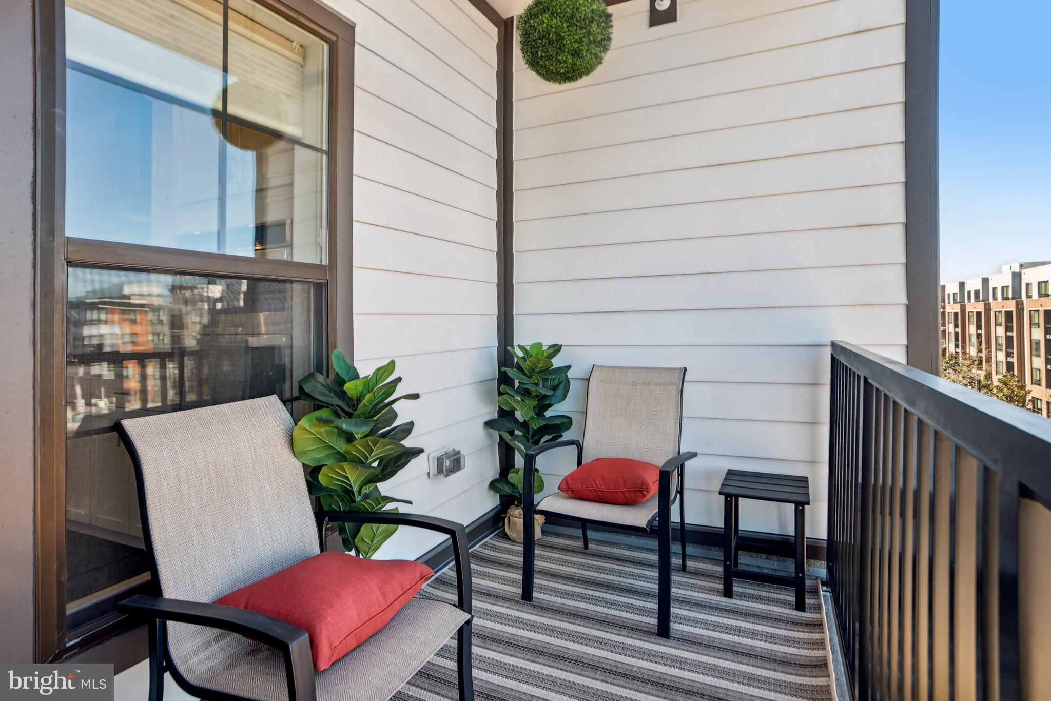 100 St Ives Place, Unit 306 Oxon Hill, MD 20745 - Photo 29 of 32 a outdoor living space with furniture