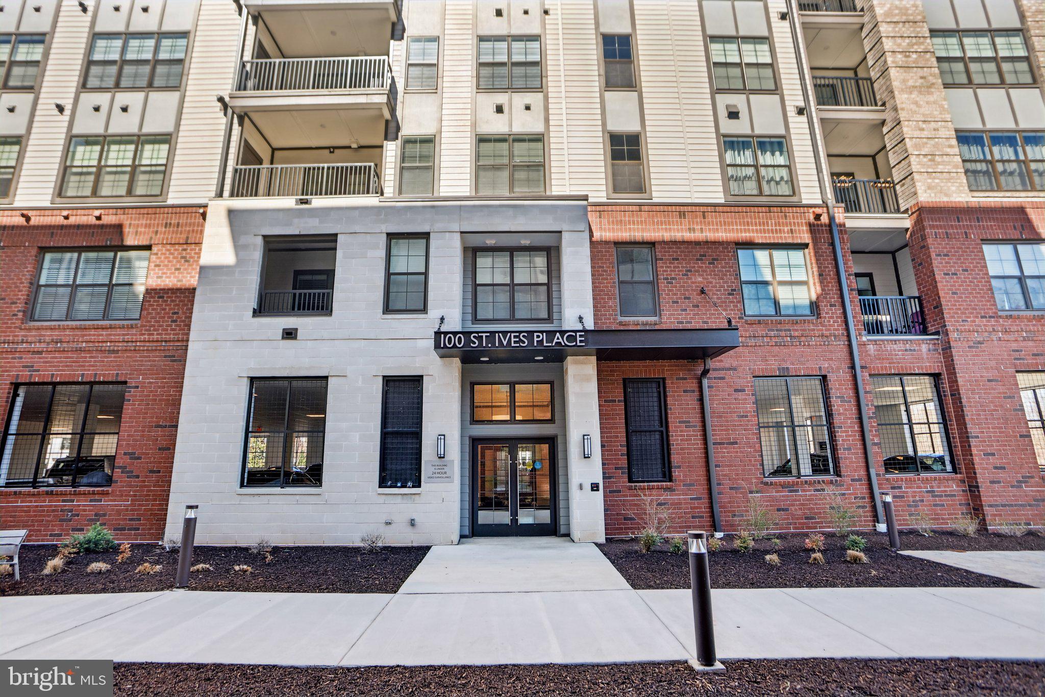 100 St Ives Place, Unit 306 Oxon Hill, MD 20745 - Photo 3 of 32 a front view of a building