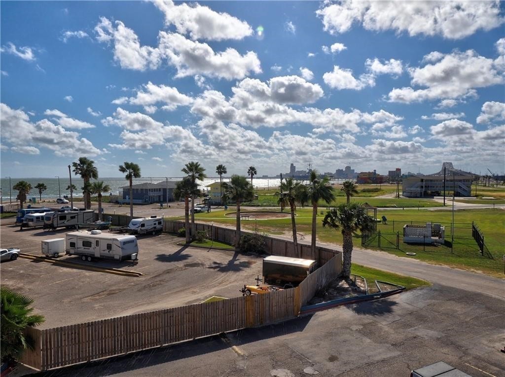 3938 Surfside Boulevard, Unit 2143 Corpus Christi, TX 78402 - Photo 17 of 17 a view of a backyard with swimming pool