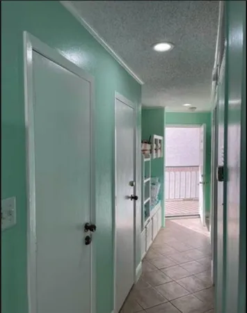 a bathroom with a glass door shower